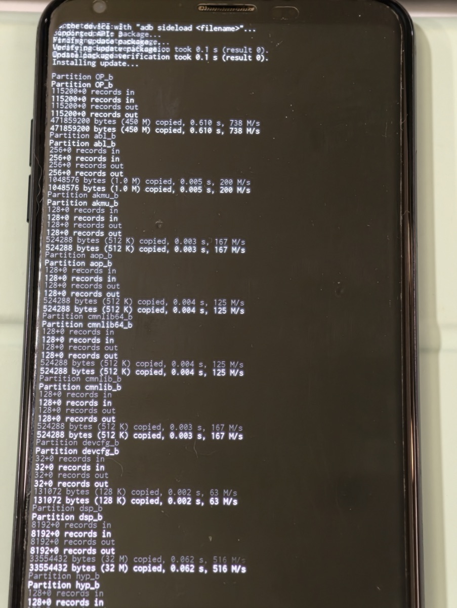 copy-partitions 執行中，逐一列出 Partition xxx_b 和 dd 的複製紀錄（13:23）